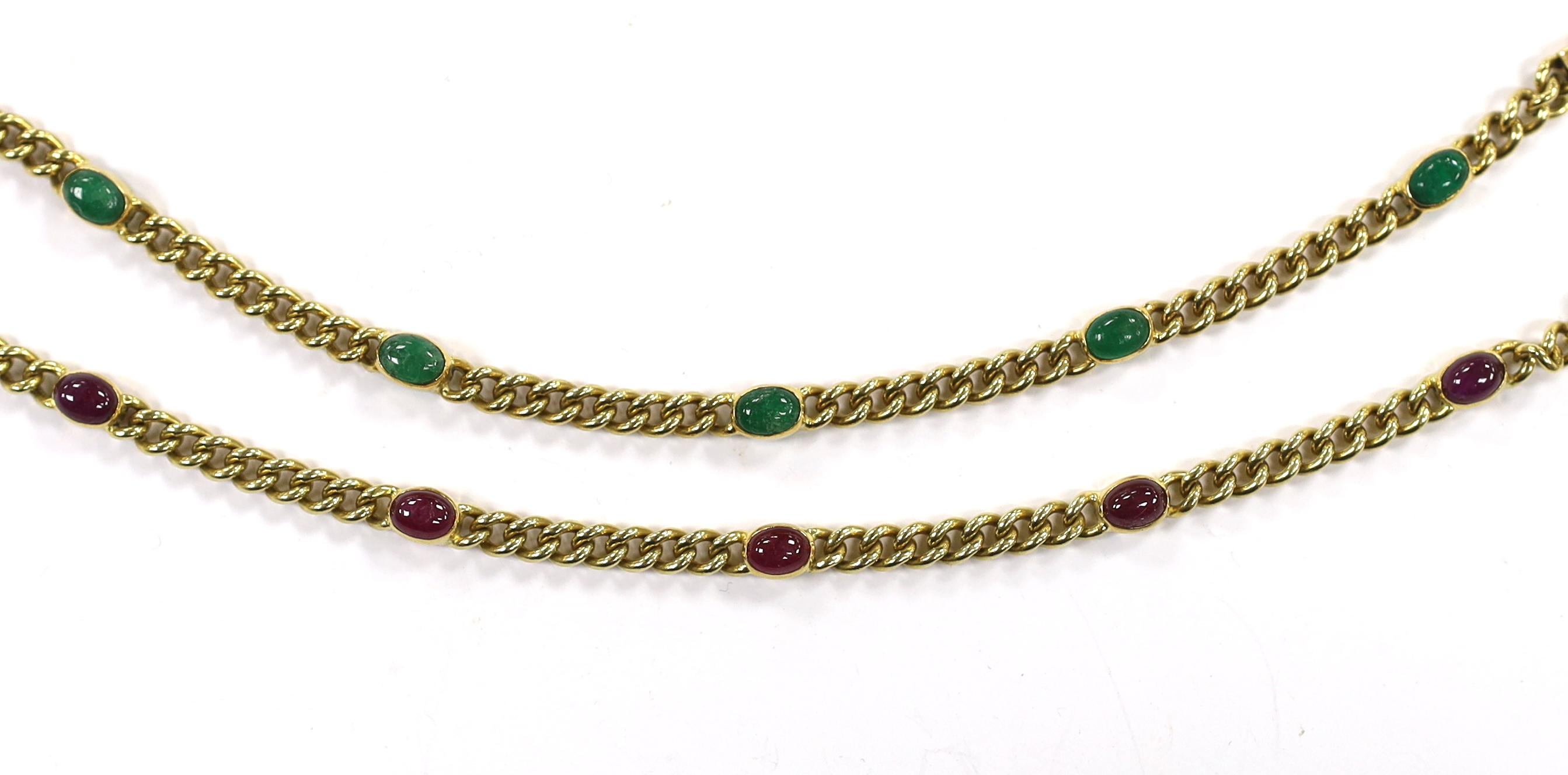 A 750 yellow metal and five stone cabochon ruby set curb link bracelet, 19.5cm and a similar cabochon emerald set bracelet, both stamped 'Kern', gross weight 36.8 grams.